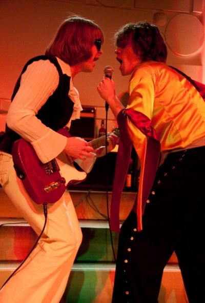 Brian (Aaron Snook) and Mick (Nick Vidal) perform a song Photo